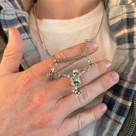 Unisex silver skeleton necklace featuring a bold, grunge-inspired design - Picture 2 of 5